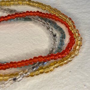 Set of Four Gold, Blue, White, and Red Small Clear Beaded Necklaces, 34" Long